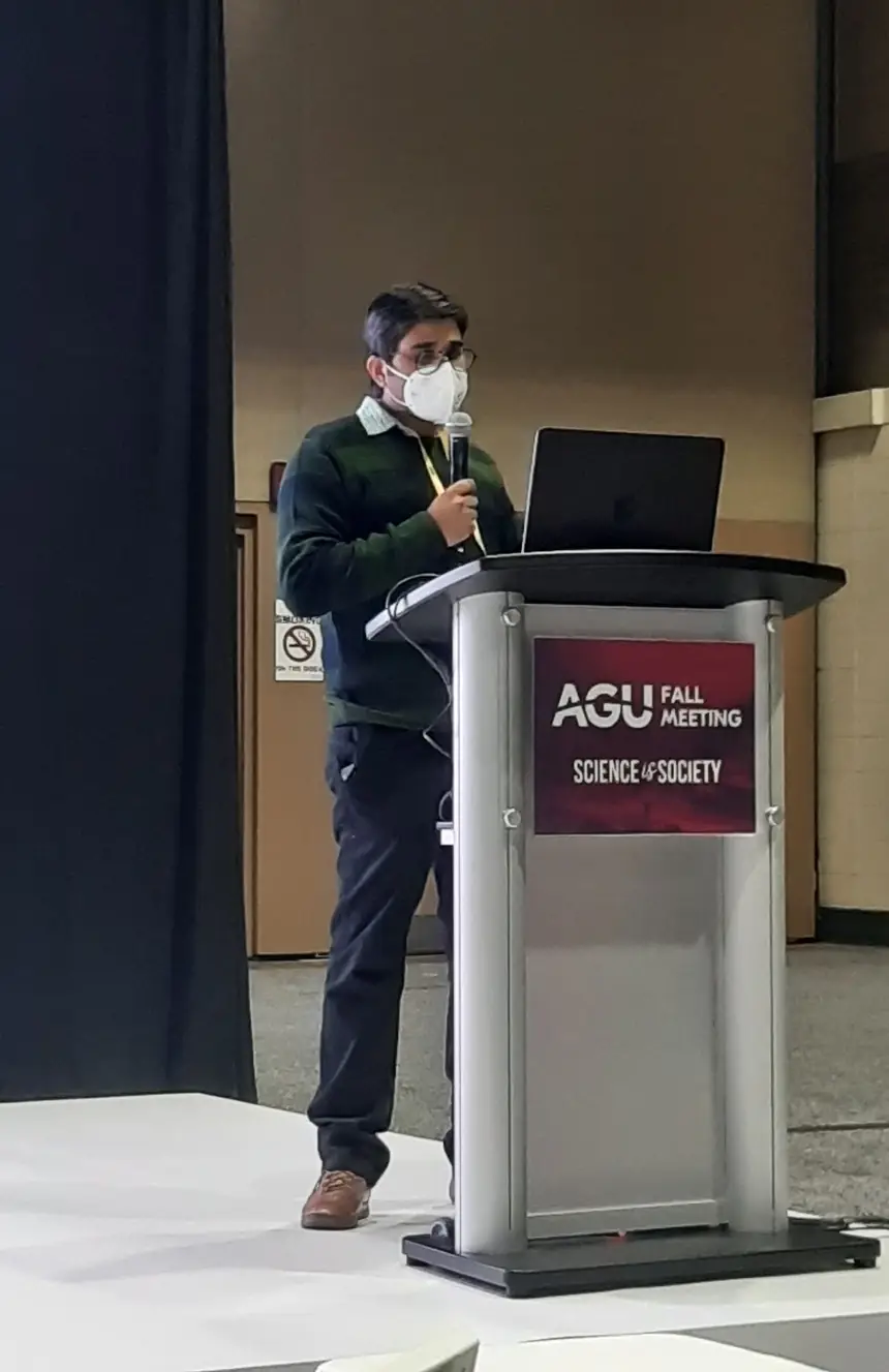 Presenting from the podium at the AGU Fall Meeting.