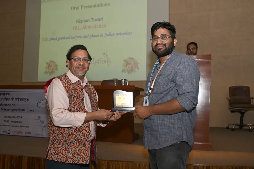 Receiving an award on stage.